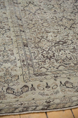 Close view of the mostly even wear and low pile on a vintage hand-knotted Hamadan runner.