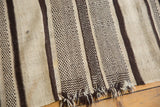 Ivory and chocolate brown hand-woven textured striped bands with fringe on Moroccan Kilim runner.