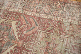 Distressed pile texture of vintage Karaja rug, geometric floral interpretations in dusty brick red.