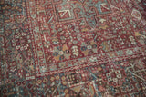 Distressed vintage Karaja rug texture with geometric vinery and exposed foundation threads.