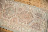 Distressed Serab runner showing geometric shapes in time-softened beige, coffee, and seafoam blue.