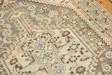 Distressed vintage Shiraz rug with soft pewter gray, antique ivory, and powder blue motifs.