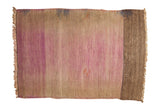 Distressed hand-woven Turkish Kilim rug mat with faded pale purple and brown overdyed colors.