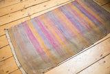 2x4 Vintage distressed Turkish Kilim rug runner with broad horizontal stripes in faded tangerine, slate blue, and beige tones, visible wear and natural patina