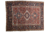 Vintage Karaja square rug with a triple medallion, geometric patterns in rich red and indigo blue.