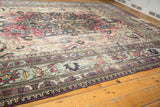 Antique Distressed Khorassan carpet border with Laleh Abassi motifs in faded fuscia, cobalt, ivory.
