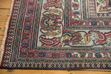 Patinated fringe, richly patterned Laleh Abassi border on antique Khorassan rug corner.