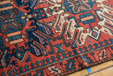Textured hand-knotted Karaja runner border with geometric brick red, navy, and ivory.