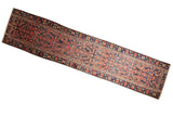 Vintage Persian Malayer rug runner with a bold allover Herati motif in indigo blue and brick red.