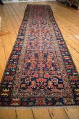 Long perspective view of the vintage Malayer runner rug with its allover Herati design.
