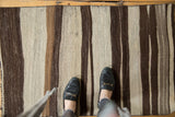 Vintage Turkish Kilim rug texture with natural striated ivory, coffee, and dark chocolate bands.