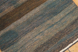 Textured detail of hand-woven vintage Kilim runner with natural wool charcoal, slate, and khaki stripes.