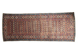 Antique Kuba runner, circa 1910s, allover floral-geometric pattern in navy, wine red, blush, 4'5
