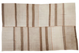 Hand woven vintage Turkish Kilim rug, ivory banded stripes, pale coffee brown patchwork.