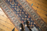 Hand-knotted vintage Kurdish runner with colorful allover Veramin design and patterned border.
