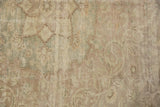 Distressed vintage Sivas rug showcasing faded tone-on-tone floral patterns and worn texture.
