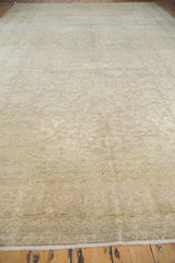 Vintage Sivas carpet showing distressed texture with subtle antique ivory and pale mauve.