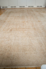 Distressed vintage Sivas carpet corner with low pile, visible knot heads, and short fringe.