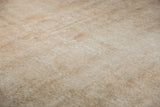 Subtle tone-on-tone neutral palette with faint designs and worn texture showing knot heads.