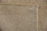 Reverse of a vintage Sivas carpet, with hand-knotted foundation, secure edge, and painted number.