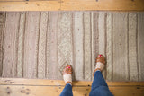 Vintage Jijim runner showing banded stripes with diamond motifs in soft mauve, sand, and antique ivory.