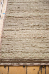 Close-up of the banded stripes and hand-woven texture of a distressed Jijim rug runner.