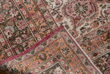 Distressed fuscia, peach, and charcoal floral patterns with visible knot heads.