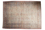 Vintage distressed Khorassan carpet, allover palmettes, vinery, muted ivory, navy, red tones.