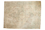 Vintage Distressed Heriz hand-knotted rug with a geometric medallion, muted ivory, green, and brown palette, 8'4