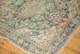 Distressed vintage Hamadan rug corner with low pile, knot heads, beige and slate blue patterns.