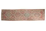 Distressed vintage Serab runner with serrated medallions, pawn motif, raspberry, ivory, blue.