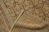 Distressed Kurdish runner's folded corner reveals worn pile, foundation, secured side, and fringe.