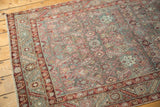 Distressed vintage Persian Malayer runner showcasing an allover Herati motif with worn knot heads.