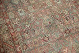Worn Herati pattern and textural pile of a distressed Malayer runner in soft teal, red, ivory.
