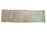 Distressed vintage Karaja runner, faded geometric medallions and vinery in powder blue and dusty gold.