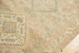Distressed vintage Serab runner corner, showing worn pile, subtle geometric motifs, and muted tones.