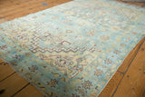Excellent abrashes and nuanced weaving with pale blue, gold, and brown geometric patterns.