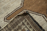 Vintage hand-knotted Gabbeh rug's geometric pile pattern and striped foundation.