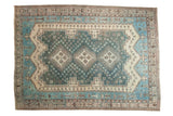 Decorative vintage Persian Sirjan carpet with aqua blue, ivory, navy, and triple center medallions.