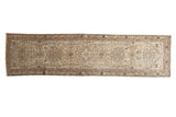 Distressed Hamadan runner, geometric medallion, stylized field motifs in ivory and brown, 2'5