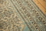 Distressed Malayer rug showing low pile texture, Mir Serbend border, and Herati motifs.