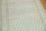 Mir Boteh design detail with soft powder blue and pale raspberry abrashes.