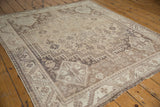 Distressed Southwestern Persian Shiraz rug corner with geometric spandrel and border.