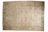 Vintage distressed Heriz carpet with even wear revealing foundation in geometric ivory and beige.
