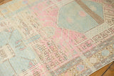 Worn geometric patterns and distressed texture in pastel pink, blue, and ivory tones.