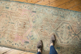 Distressed Serab rug runner showing geometric patterns, even wear to knot heads, and soft antique tones.