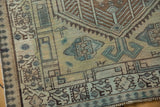 Distressed Serab runner detail, geometric pawn motif border in antique ivory and dusty teal.
