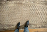 Distressed vintage Mir Serbend runner with decorative Mir Boteh 'germinating tree' motif, ivory and brown tones.