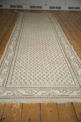 Distressed vintage Mir Serbend runner with ivory and charcoal Mir Boteh design, even wear.