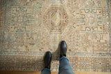 Even wear across this distressed Karaja rug, with geometric motifs and powder blue.